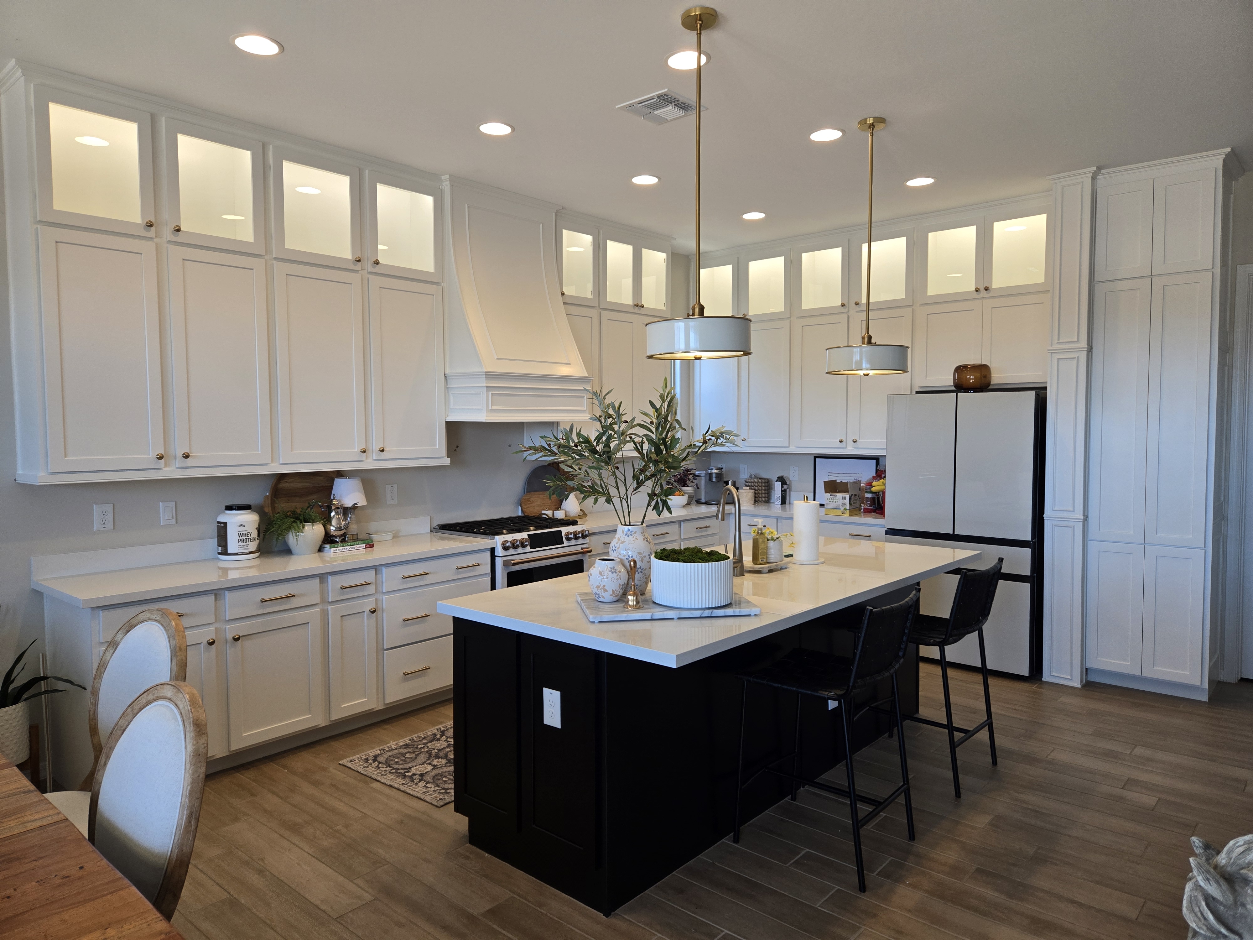 Custom kitchen with glass front cabinets